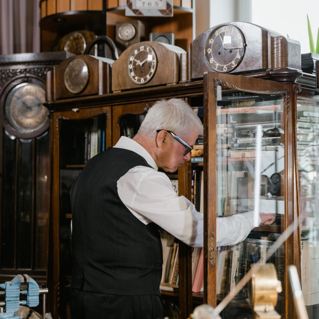 Portrait of a Dutch antique cabinet dealer in his Utrecht showroom.